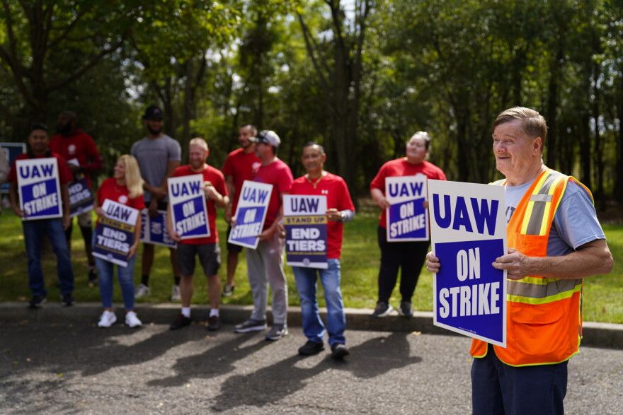 United Auto Workers members and supporters picket outside a General Motors facility in Langhorne, Pa., Friday, Sept. 22, 2023. The United Auto Workers expanded its strike against major automakers Friday, walking out of 38 General Motors and Stellantis parts distribution centers in 20 states.
