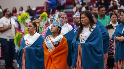 Star Yellowfish, director of Native American student services for Oklahoma City Public Schools (left), attends a powwow with students in 2025.