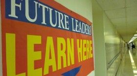 A banner hanging in a hallway at Lansing's STEM Academy