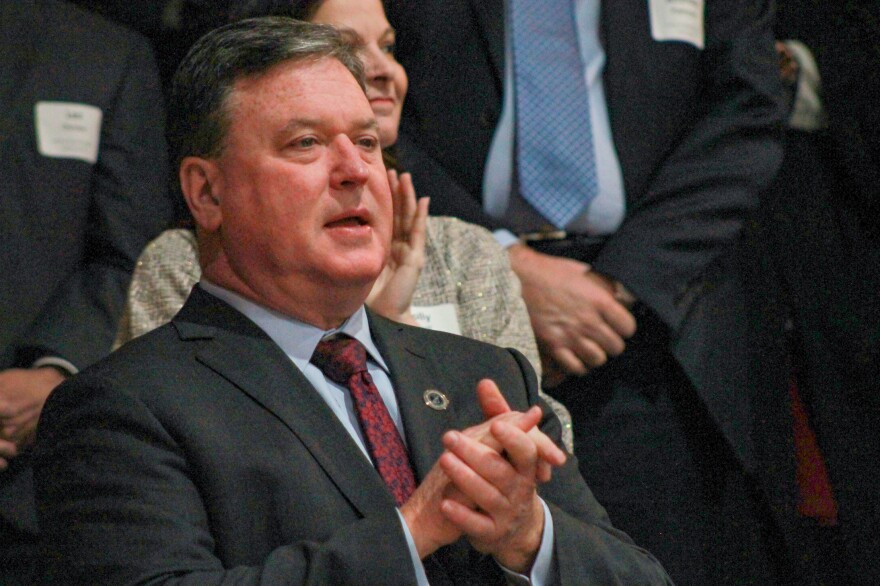 Indiana Attorney General Todd Rokita is pictured. He's in a crowd and appears to be applauding. 