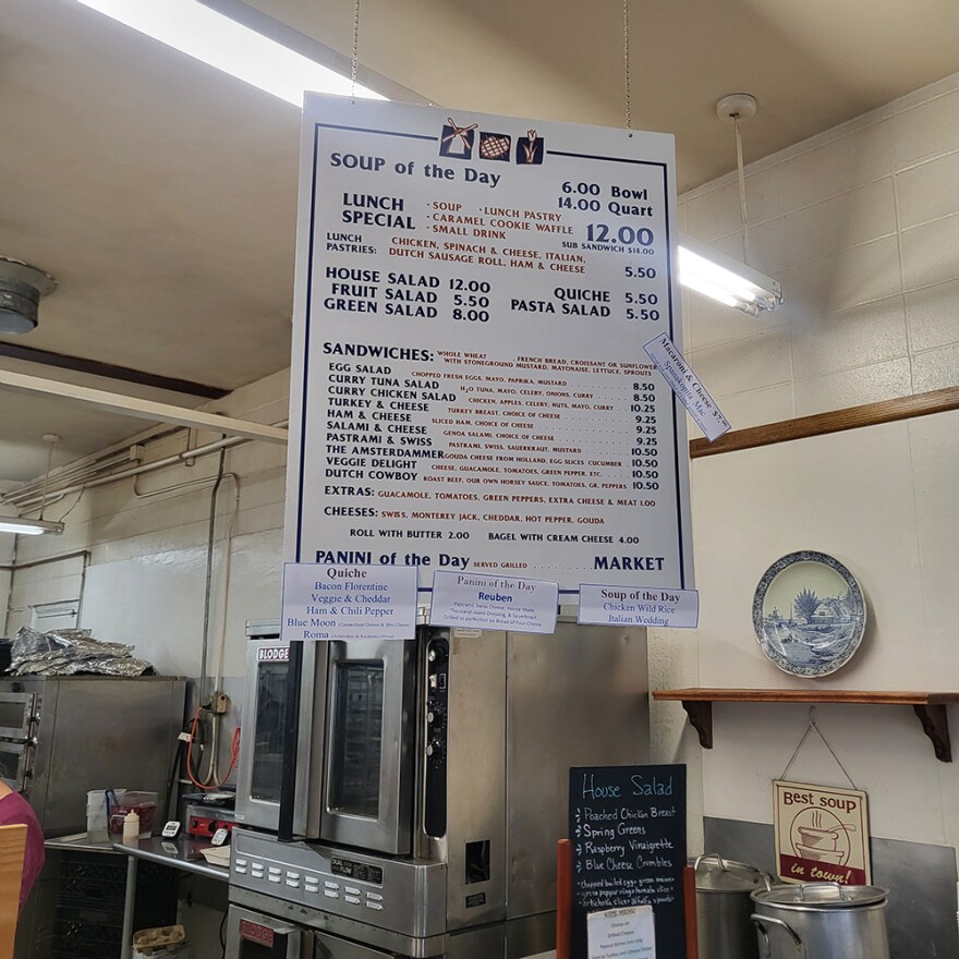 The menu board has remained mostly the same over the years at Caramel Cookie Waffles.