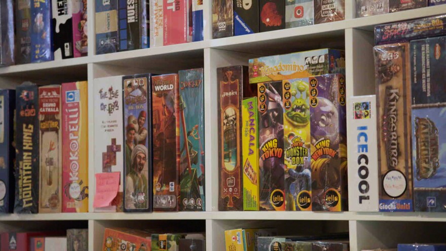 A shelf full of board games