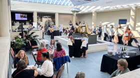 Local teachers gather and socialize during the Memorial Art Gallery's Teacher Open House. The MAG holds several educator-centered events per year to offer teachers appreciation and the opportunity to learn about the museum's free educational opportunities for students.
