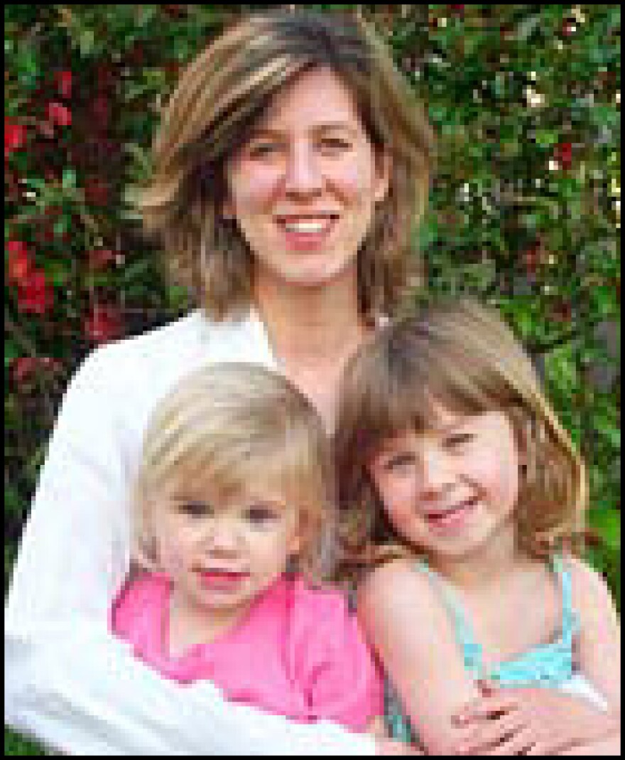 Catherine Savage with daughters Lindsey (left), and Karenna (right).