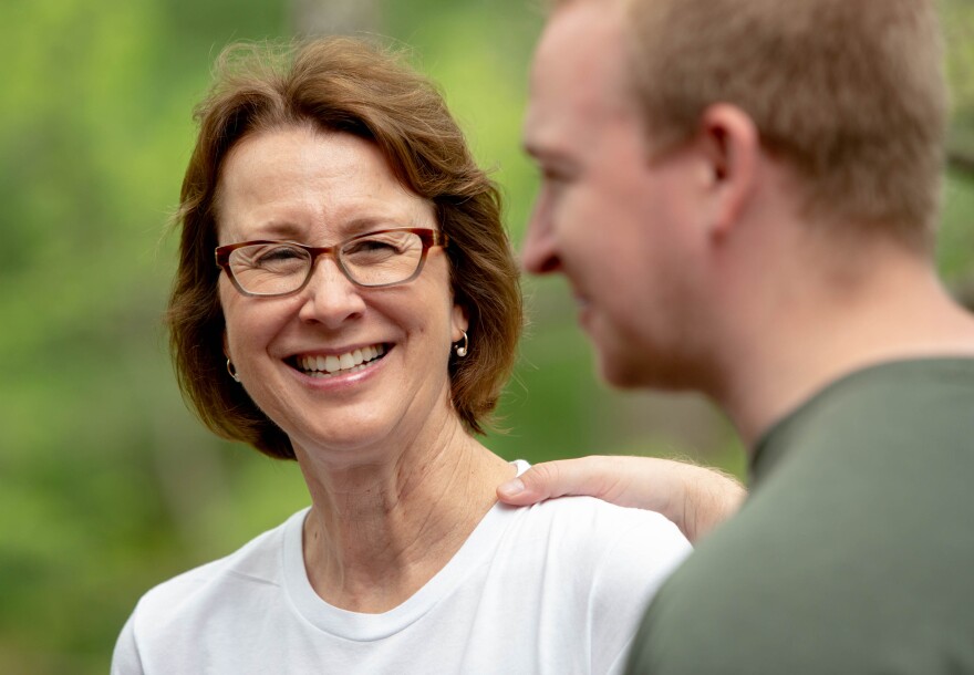 Trish Gunby, Democratic congressional candidate for MO-02, looks to her son and Communications Director Kyle Gunby