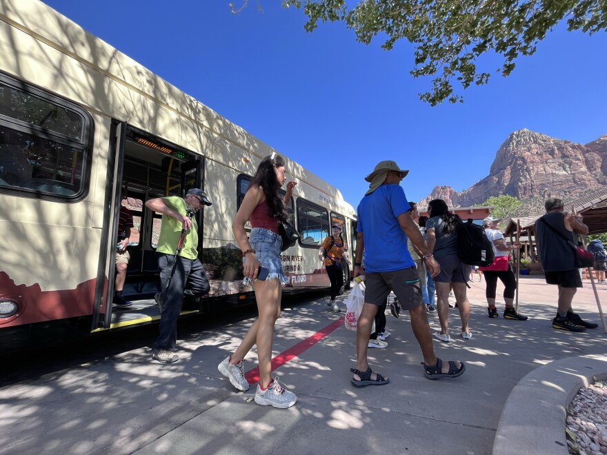 Visitors step off a shuttle at Zion National Park, Sept. 22, 2023. The new bus line from St. George will bring riders to Springdale, where they can connect with the park’s system of free shuttles.