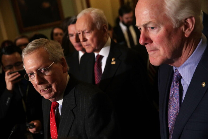 Senate Majority Leader Sen. Mitch McConnell (R-Ky.) (left) speaks during a news briefing at the U.S. Capitol on Nov. 28, 2017 in Washington, D.C. (Alex Wong/Getty Images)