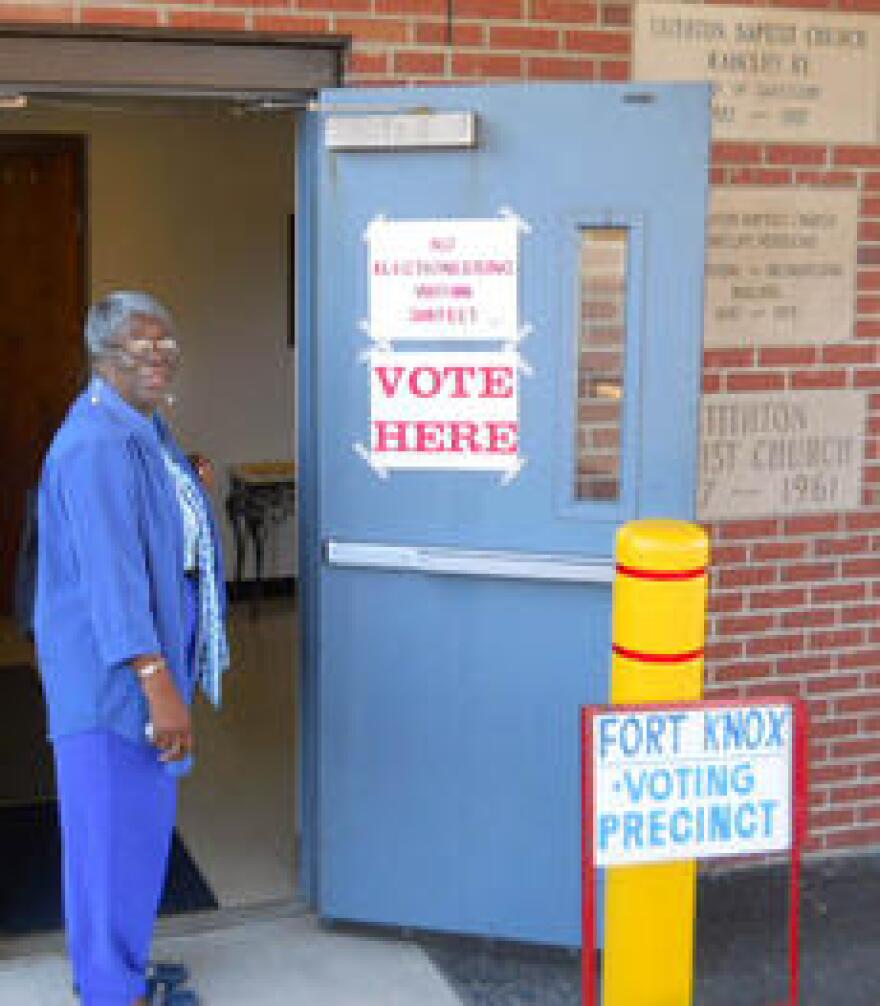Eleanor Guerrero prepares to enter the Fort Knox precinct at Stithton Baptist Church to cast her first vote as a U.S. citizen. The 72-year-old native of Belize became an American this summer after living 43 years in the country.
