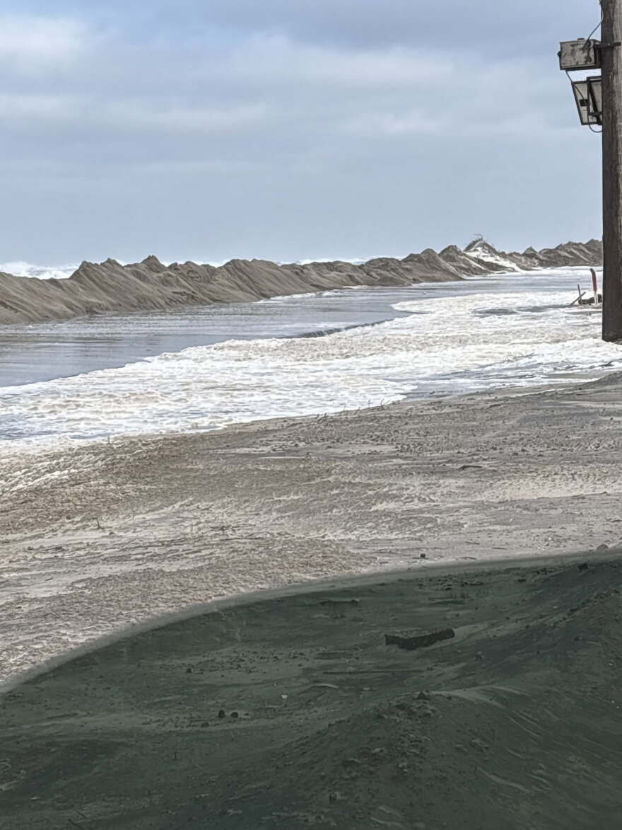 Two to four feet of ocean water is flooding vulnerable areas, forcing state transportation crews into a non-stop battle to keep sand and ocean overwash from destroying Highway 12. The road is shut down from the Marc Basnight Bridge to Rodanthe.
