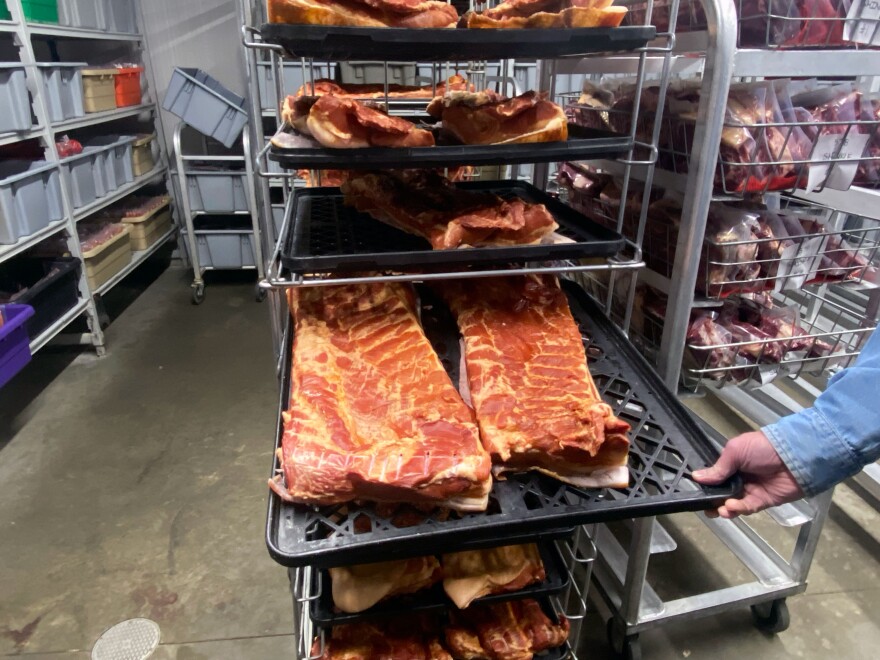 A rack of smoked bacon at a family owned meat processing plant in Darke County.