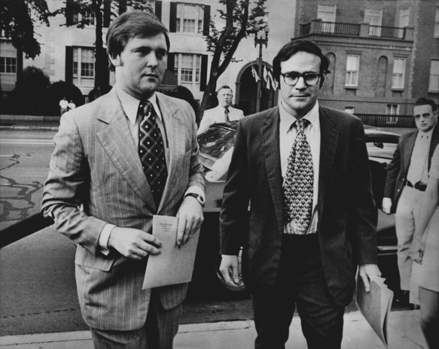 Rufus Edmisten, deputy counsel, left, and Terry Lenzner, assistant majority counsel, carry the Senate Watergate Committee subpoenas for the presidential tapes as they arrive at the Executive Office Building in Washington D.C., July 23, 1973.