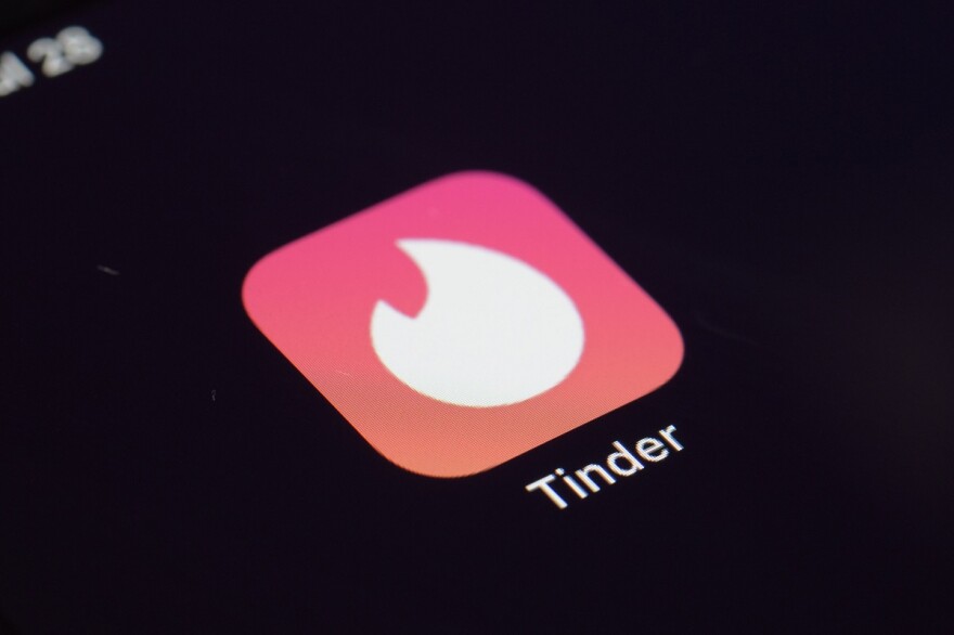 FILE - The icon for the Tinder dating app appears on a device on July 28, 2020.