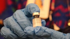 A dose of the Pfizer COVID-19 vaccine was shown to reporters at the Arkansas Department of Health on Dec. 14, 2020 just before the first doses were administered in the state.