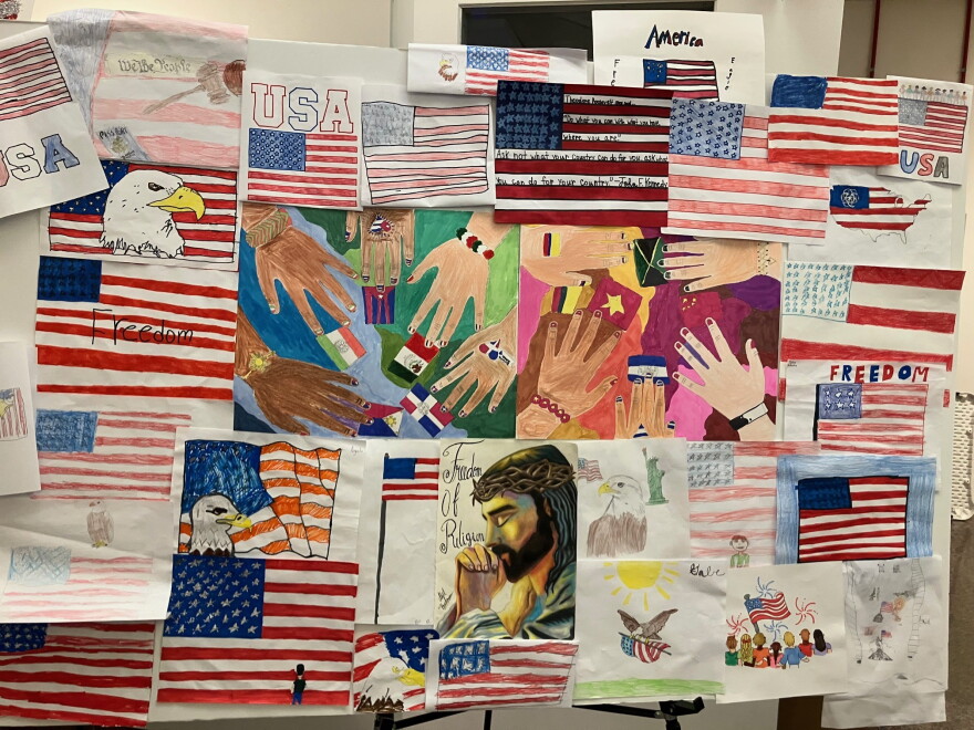 Patriotic artwork from students at Alleman, Seton and Jordan Catholic schools was displayed in the Centennial Hall lobby.