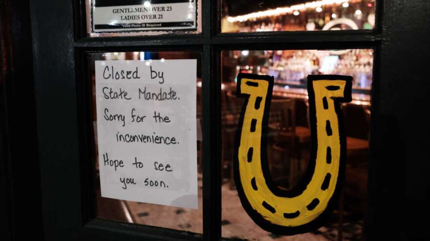 A Brooklyn restaurant tells would-be customers it is closed on Sunday, after a decree that all bars and restaurants in New York City shut down.