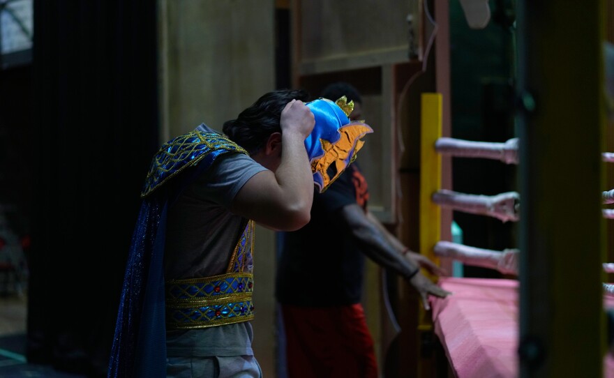 Joseph Quick puts on his custom mask before the open house rehearsal on Tuesday, March 07, 2023, at the MU Rhynsburger Theatre.