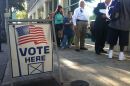 Voters line up outside a Downtown Fresno polling location.