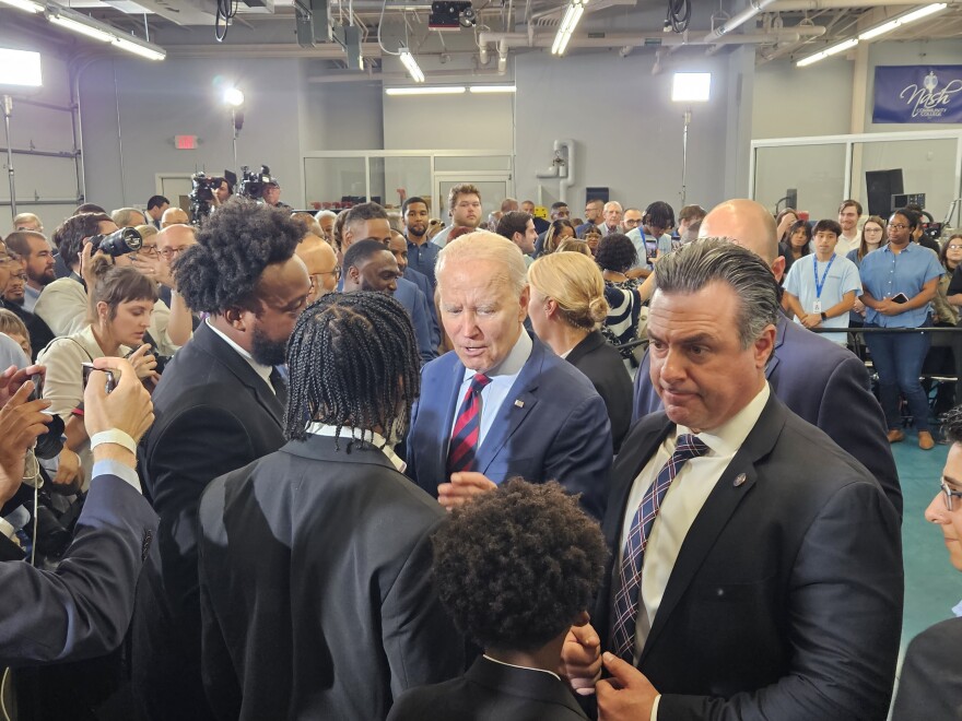 President Joe Biden speaks with the sons of North Carolina Congressman Don Davis after an event in Rocky Mount.