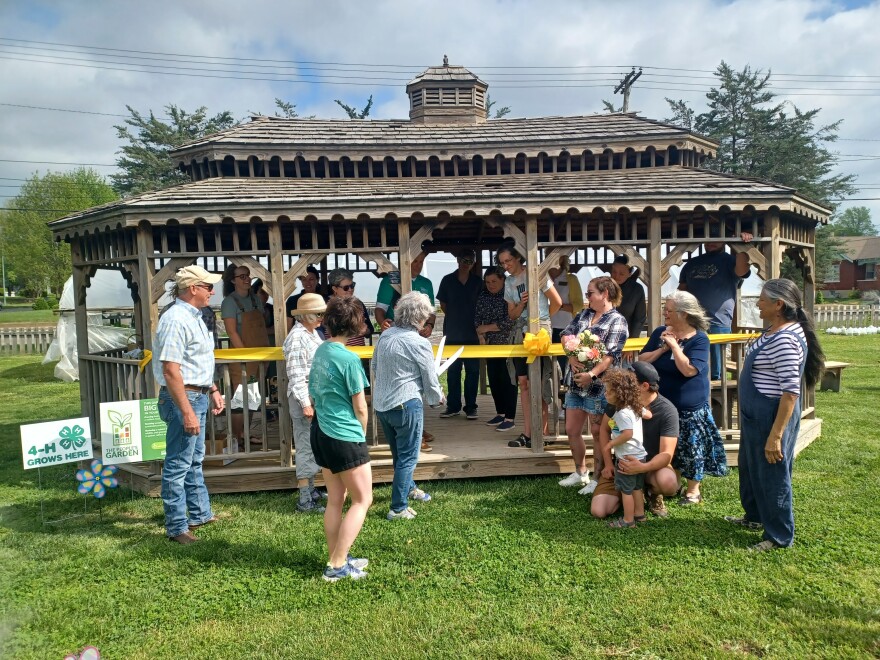 The ribbon is cut to celebrate the People's Garden grant (photo taken April, 2024).