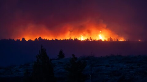 The Bench Fire burns on the Warm Springs Reservation, seen from Culver, Ore., on July 27, 2026.