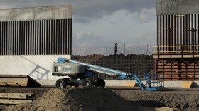 The first panels of levee border wall are seen at a construction site along the U.S.-Mexico border last month in Donna, Texas. The new section, with 18-foot-tall steel bollards atop a concrete wall, will stretch approximately 8 miles.