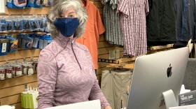Travel Essentials co-owner Nancy Bestor at her shop in downtown Ashland.