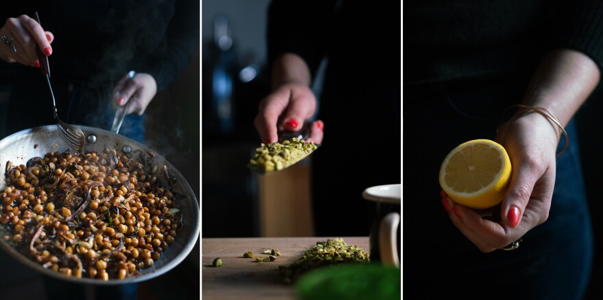 Roman stirs the chickpeas as they cook from the recipe<em> Frizzled Chickpeas and Onions with Feta and Oregano</em>, scoops chopped pistachios onto a knife, and a holds half lemon to be squeezed into yogurt.