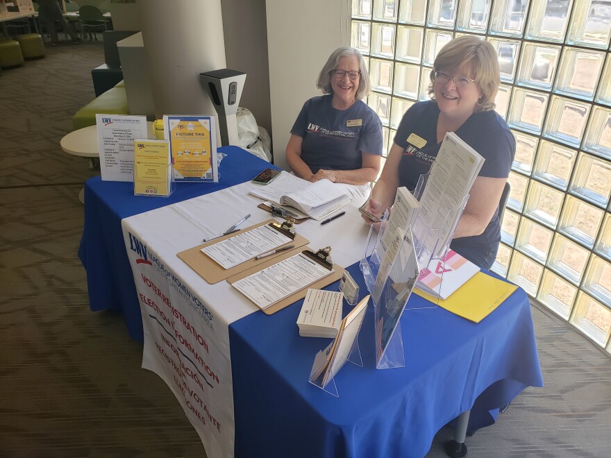 San Antonio League of Women Voters volunteers, Mary Dierolf to the left, and Alene Lindley were helping voters register to vote on Oct. 5 at the Collins Gardens Public Library