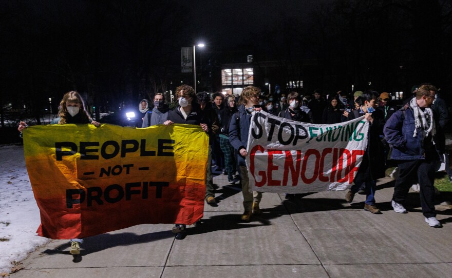 Pro-Palestinian students at Michigan State University march from Wells Hall to Cowles House in East Lansing, Michigan, on Feb. 5, 2025, after members of the university's Board of Trustees failed to attend a public meeting the group had planned.