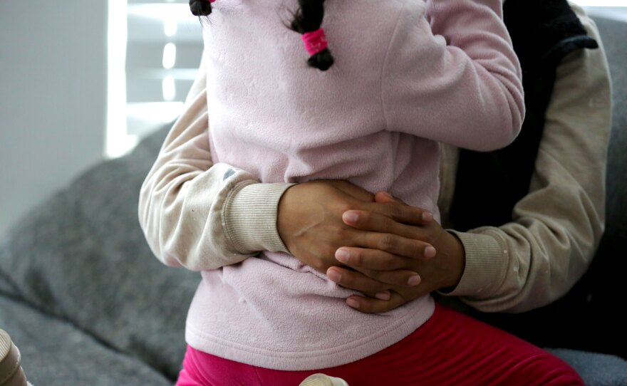 Mayra Vaca Latacunga holds her 6-year-old daughter Camila in Biddeford, Maine on Feb. 4, 2026. Latacunga picked up by immigration agents in January after she dropped off Camila at school.