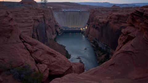 The Colorado River flows beneath the Glen Canyon Dam at the Glen Canyon National Recreation Area, Tuesday, July 14, 2026, near Page, Nev. (John Locher/AP)