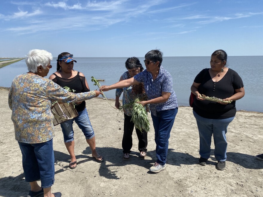 Members of different Yokut tribes share offerings at the ceremony.