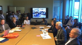 U.S. Sen. Bill Nelson and Rep. Kathy Castor and Rep. Charlie Crist talk to local business owners about how red tide is affecting tourism in Pinellas County.