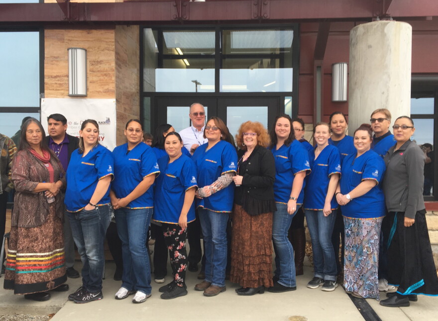 Blackfeet Community College faculty, staff and nursing students stand in front of the new $7.5 million building. 