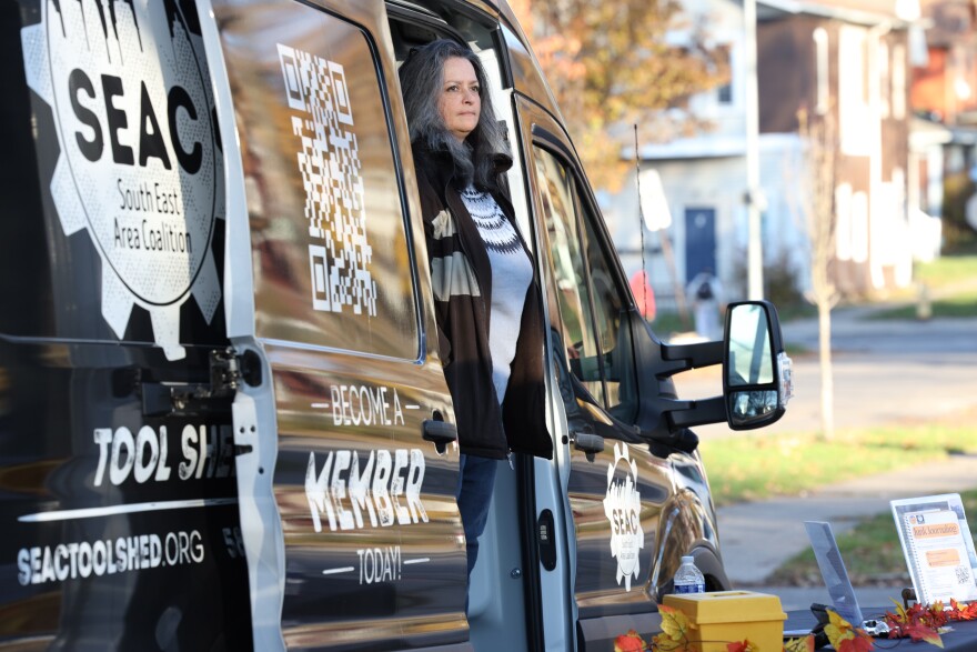 Tera James sets up the SEAC mobile tool shed van at the Willie W. Lightfoot R-Center on Flint Street in Rochester on Thursday, November 20, 2025. This was the first appearance of the traveling tool shed in the neighborhood, where residents can sign up and borrow tools.