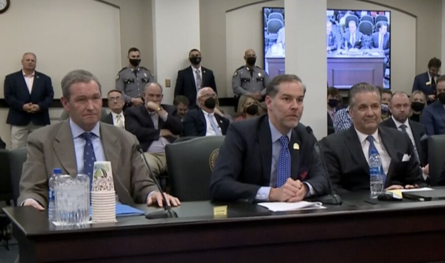 From left to right: UK athletics director Mitch Barnhart, State Senator Max Wise, UK men's basketball coach John Calipari