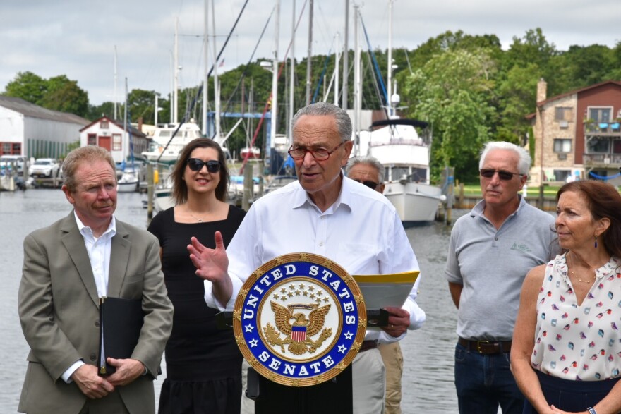 Senate Majority Leader Chuck Schumer of New York gathered with elected officials and environmentalists in Patchogue on Long Island on July 10, 2021 to announce plans to push for tens of millions of dollars for Suffolk County to overhaul its septic system.