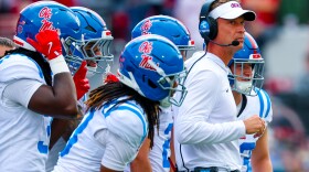 Oct 25, 2025; Norman, Oklahoma, USA; Ole Miss Rebels head coach Lane Kiffin during a timeout with his players during the second half against the Oklahoma Sooners at Gaylord Family-Oklahoma Memorial Stadium. Mandatory Credit: Kevin Jairaj-Imagn Images
