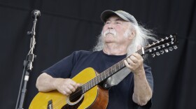 FILE - David Crosby of the band Crosby, Stills and Nash, performs at Glastonbury Festival in England, on June 27, 2009. Crosby, the brash rock musician who evolved from a baby-faced harmony singer with the Byrds to a mustachioed hippie superstar and an ongoing troubadour in Crosby, Stills, Nash & (sometimes) Young, has died at age 81. His death was reported Thursday, Jan. 19, 2023, by multiple outlets. (AP Photo/Joel Ryan), File)