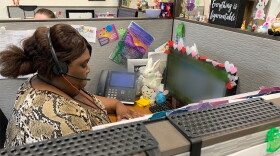 A crisis counselor answers calls at First Choice Services in West Virginia.