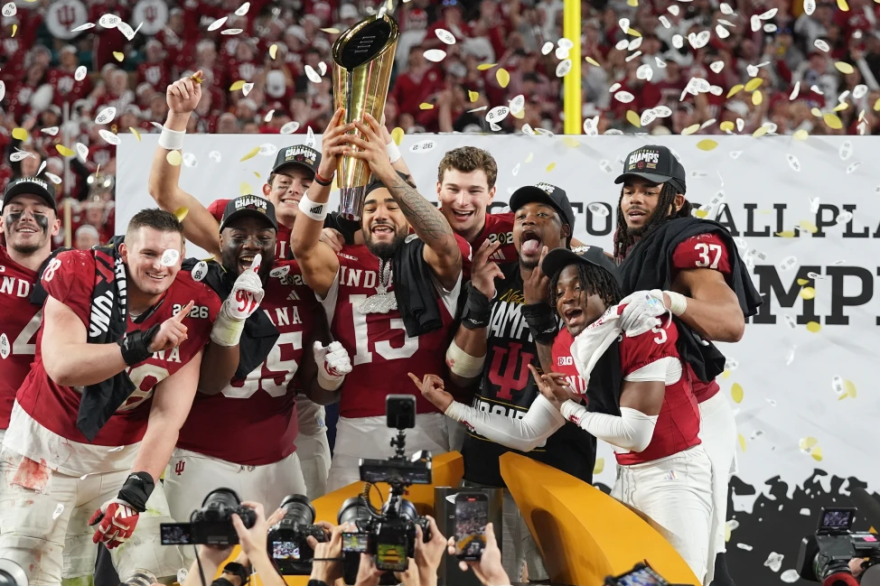 Indiana holds the trophy after their win against Miami in the College Football Playoff national championship game, Monday, Jan. 19, 2026, in Miami Gardens, Fla.