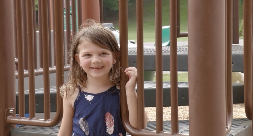 Guinevere Millea on a playground. 