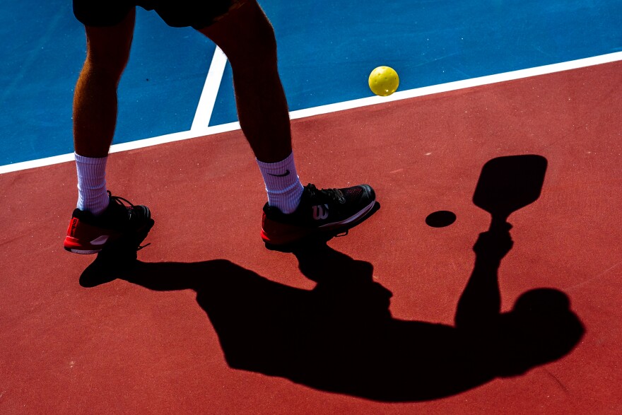 Hunter Johnson, 29, of New Braunfels, Texas, serves the ball on Thursday, Aug. 10, 2023, during the Association of Pickleball Players Sunmed St. Louis Open Tournament at the Dwight Davis Tennis Center in Forest Park. Johnson defeated Jack Foster, of Vero Beach, Fla., in the men's singles quarterfinals during the tournament.