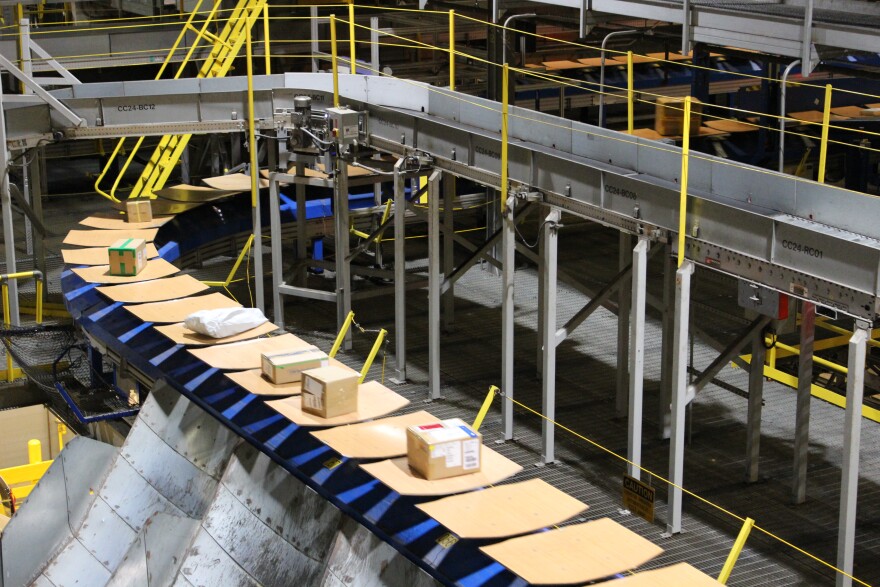 Both DHL and Amazon use this DHL facility at CVG to process packages. The nighttime operation belongs to DHL.