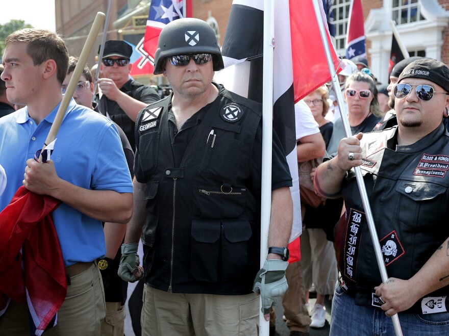 Hundreds of white nationalists, neo-Nazis and members of the "alt-right" march down East Market Street toward Emancipation Park during the "Unite the Right" rally August 12, 2017 in Charlottesville, Virginia.
