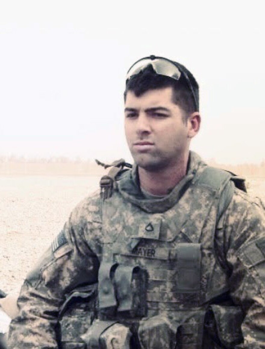 Mayer in Iraq in 2010, where he served as a sniper and was injured in a roadside explosion.
