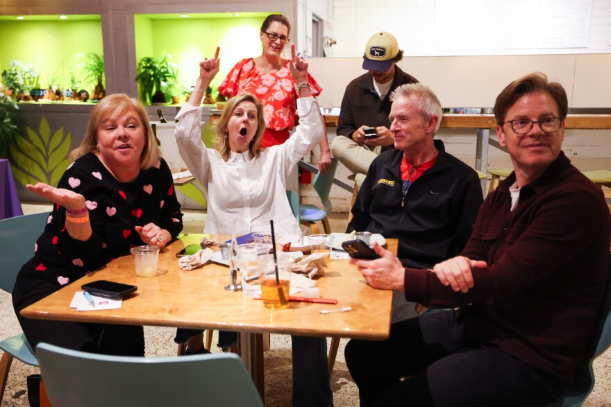 A team of participants playfully heckles another team after they won a round at Sex Ed Trivia Night on Thursday, Feb. 8, 2024, at Hello Dumpling in Dallas. The event benefits Wholly Informed Sex Ed, a nonprofit that advocates for comprehensive, medically accurate sex education.