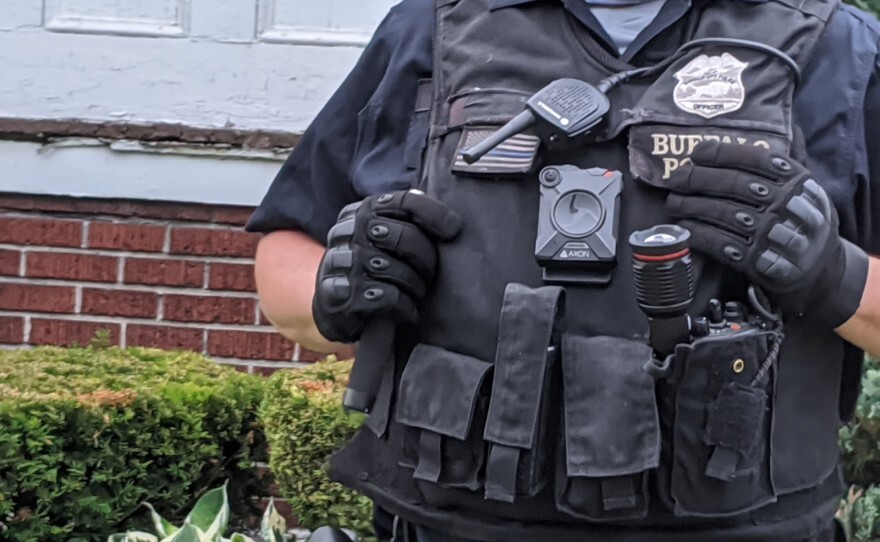 A male uniformed Buffalo Police officer with his name tag covered