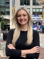 Stephanie Haney in front of the Idea Center in Downtown Cleveland.