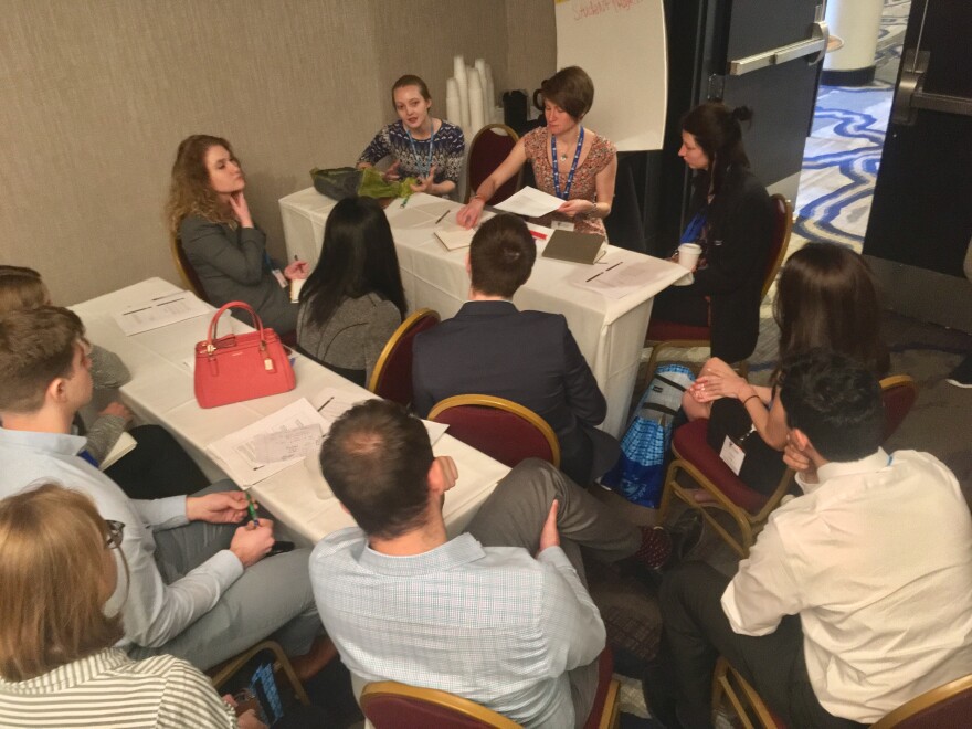 A group of medical students discuss ways to improve their training -- and the training of their instructors -- at the Rochester meeting of the American Academy of Developmental Medicine and Dentistry.